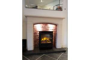 Sissari limestone fireplace with brick effect chamber
