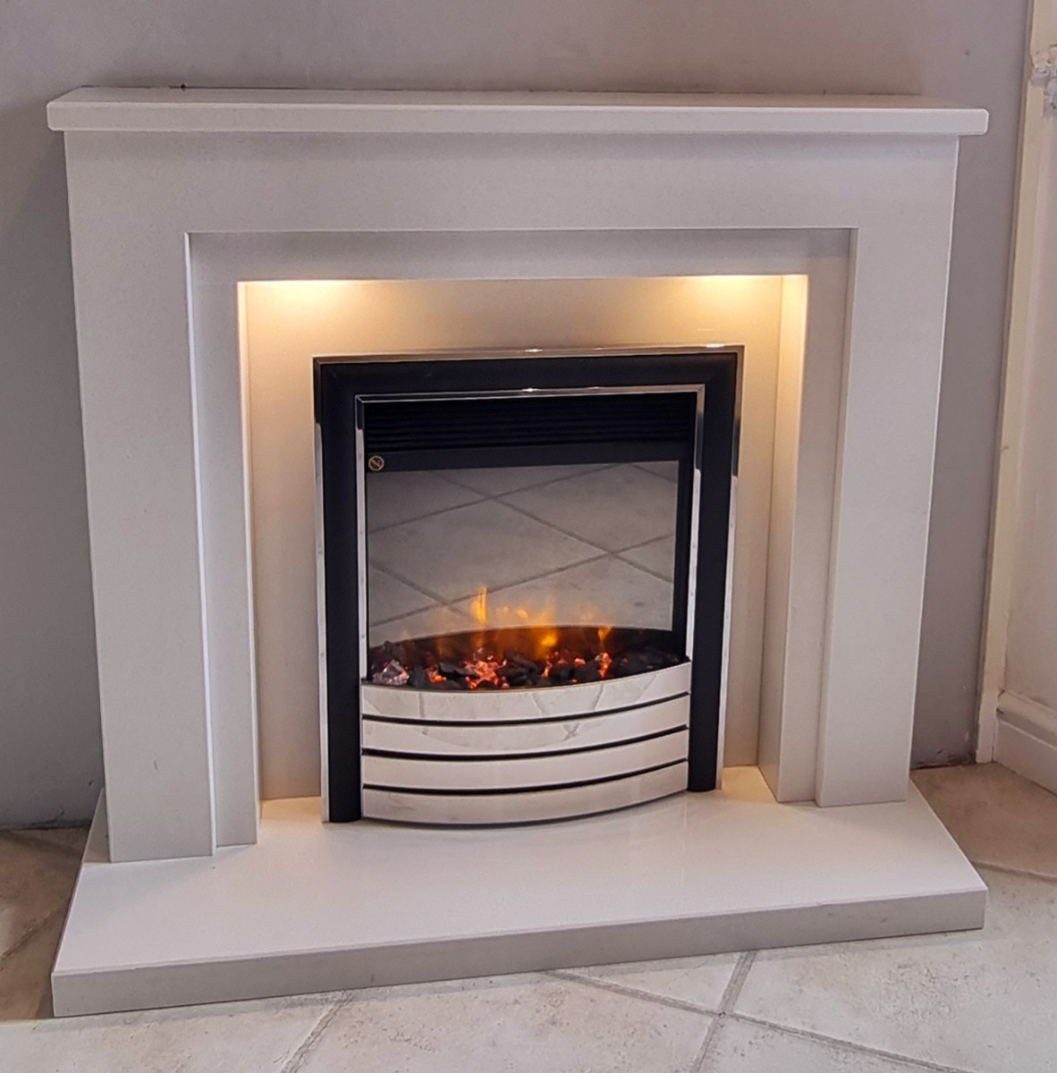 CORTONA WHITE MARBLE FIREPLACE WITH DOWNLIGHTS