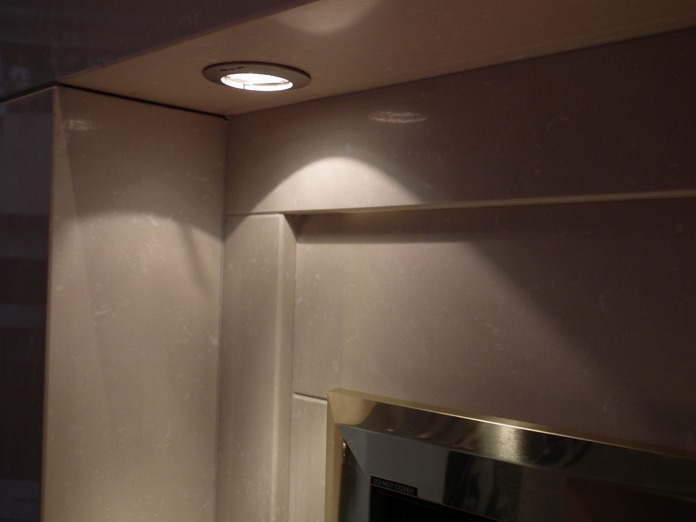 Small Lister limestone fireplace with lights