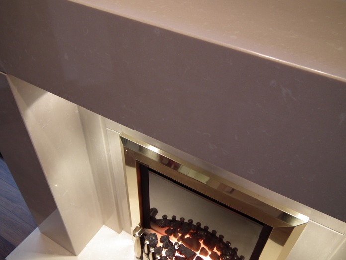 Small Lister limestone fireplace with lights