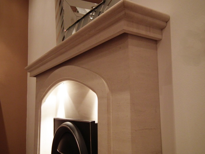 Mirage limestone fireplace with lights