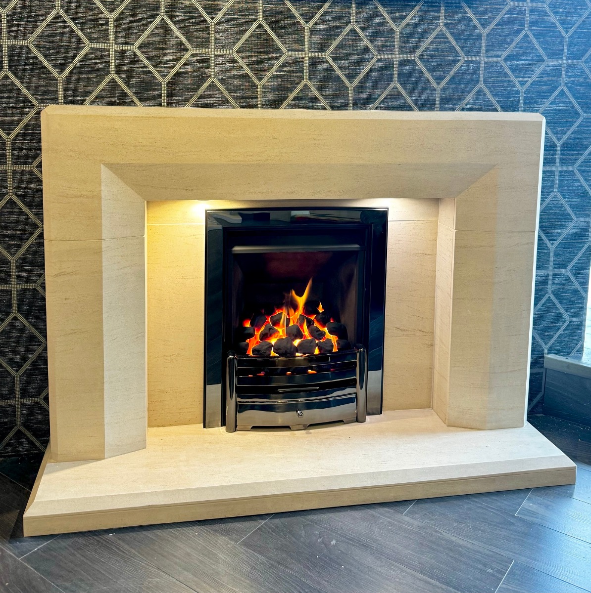Optica Limestone fireplace with lights