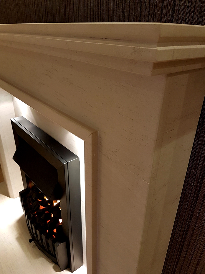 Kibble limestone fireplace with lights