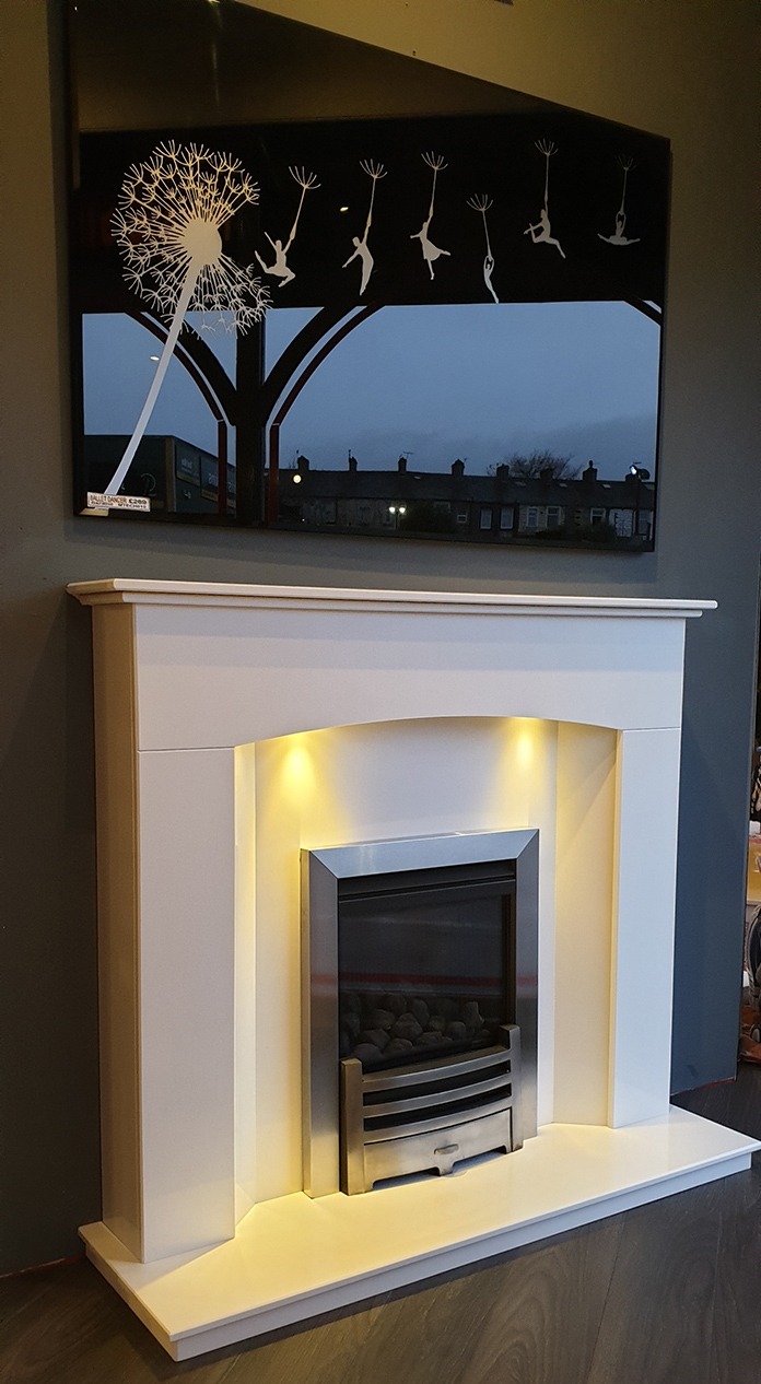 Oregon Marble fireplace with downlights