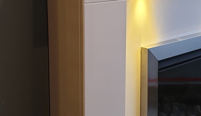 Oregon Marble fireplace with downlights