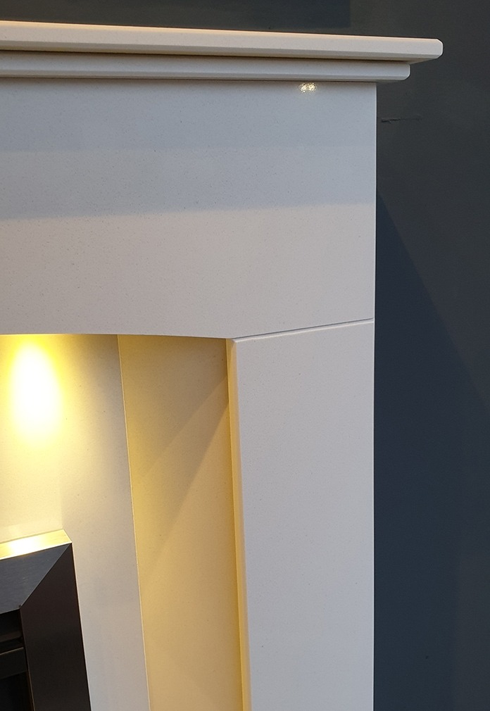 Oregon Marble fireplace with downlights