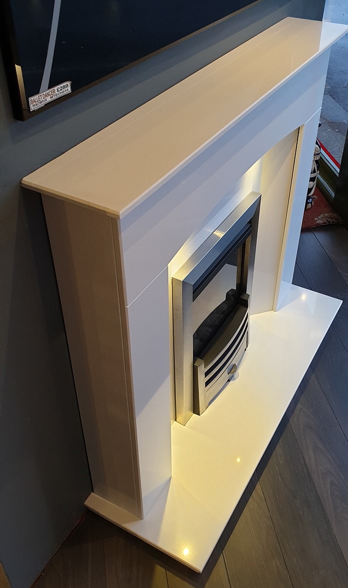 Oregon Marble fireplace with downlights