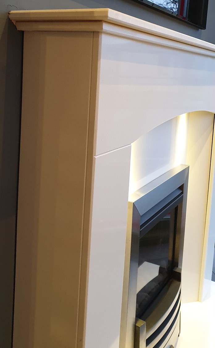 Oregon Marble fireplace with downlights