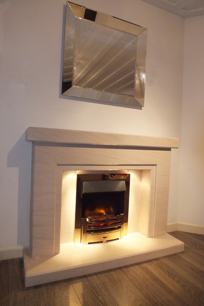 Salus limestone fireplace with lights