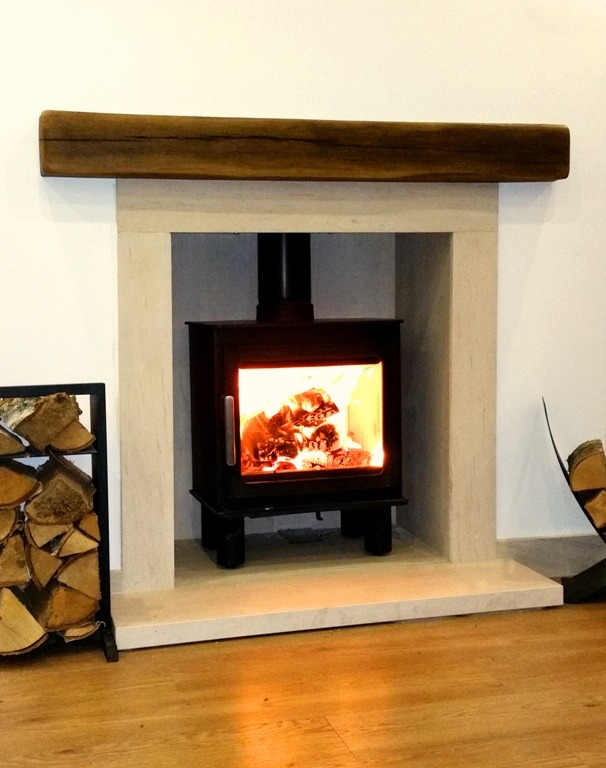 The Wren fireplace with wood look beam & chamber