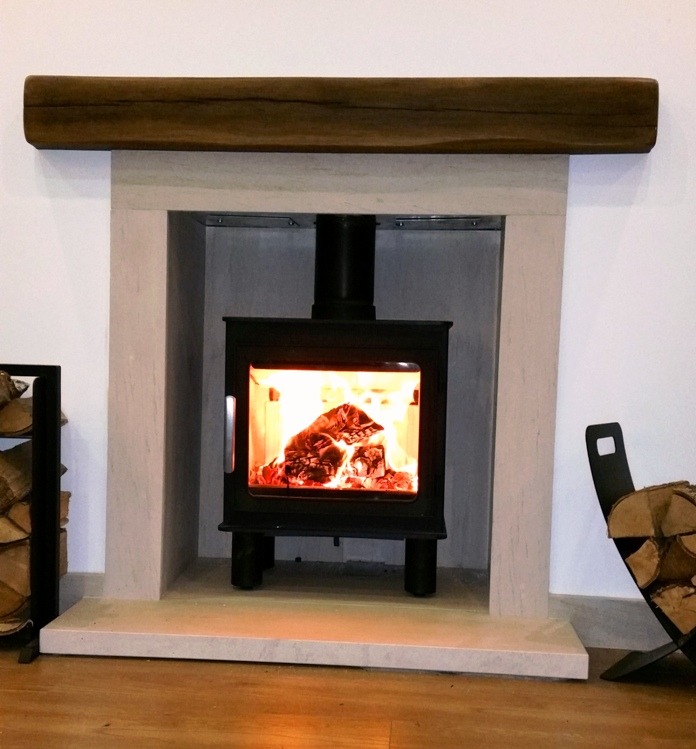 The Wren fireplace with wood look beam & chamber